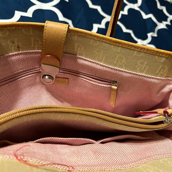 Great used Dooney and bourke monogrammed cream and patina handled tote - Picture 9 of 10